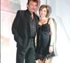 Portant sur son illustre père Johnny Hallyday.
Johnny Hallyday et Laura Smet en 2003
©AGENCE / BESTIMAGE