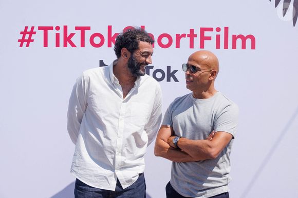 Éric Judor et Ramzy Bedia assistent à la cérémonie des lauréats du concours international de courts métrages TikTok #TikTokShortFilm qui se tient à La plage de la palme le 23 mai 2023 à Cannes, France. Photo by David Boyer/ABACAPRESS.COM