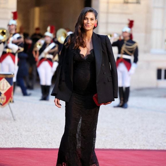 Tatiana Silva (enceinte, ancienne miss Belgique) arrivant au dîner d'état au palais de l'Elysée à Paris en l'honneur de la visite du roi et de la reine de Belgique en France le 14 octobre 2024.

© Dominique Jacovides / Bestimage