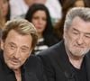 "C’est avec un immense regret que je vous annonce cette annulation. J’étais impatient de vous retrouver cet été, mais ma santé doit passer avant tout"

Johnny Hallyday et Eddy Mitchell - Enregistrement de l'émission "Vivement Dimanche" à Paris le 14 mars 2014. L'émission sera diffusée ce dimanche 16 Mars. © COADIC GUIREC / BESTIMAGE
