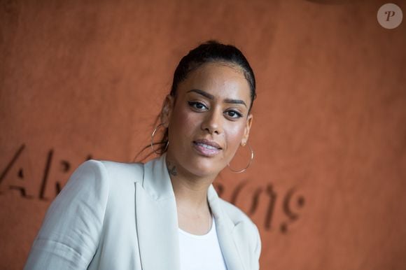Et c'est en supprimant quatre aliments qu'elle a réussi cette transformation notable. 


Amel Bent - Célébrités dans le village des internationaux de France de tennis de Roland Garros à Paris, France, le 6 juin 2019. © Jacovides-Moreau/Bestimage