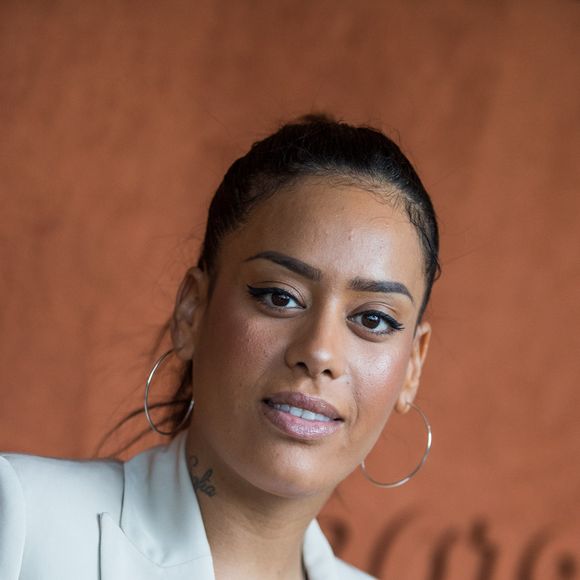 Et c'est en supprimant quatre aliments qu'elle a réussi cette transformation notable. 


Amel Bent - Célébrités dans le village des internationaux de France de tennis de Roland Garros à Paris, France, le 6 juin 2019. © Jacovides-Moreau/Bestimage