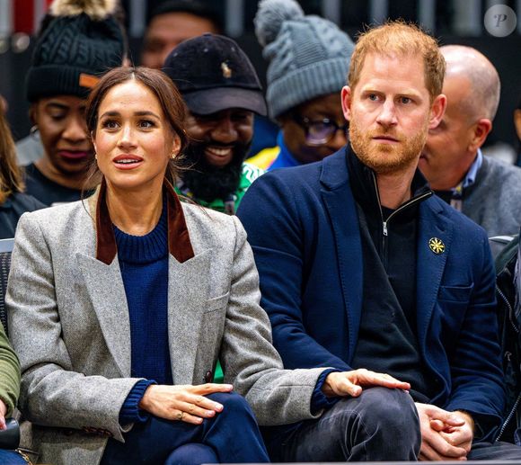 Le prince Harry, duc de Sussex et Meghan Markle, duchesse de Sussex, assistent à un match de basketball en fauteuil lors des "Invictus Games Vancouver Whistler 2025" à Vancouver, le 9 février 2025. (Backgrid USA / Bestimage).