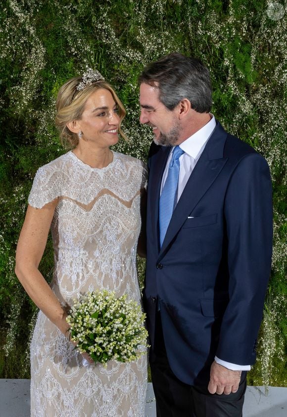 Pour l'occasion, la nouvelle mariée portait un magnifique bijou, un diadème qui a attiré l'attention pour une raison bien précise... 

Le Prince Nikolaos de Grèce et Chrysi Vardinogiannis durant leur mariage à l'église Saint Nicholas Ravagas à Athènes le 7 février 2025.. Photo by Nicky Economou/Pool/Eurokinissi/ABACAPRESS.COM