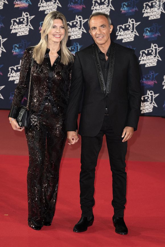 Nikos Aliagas et sa femme Tina Grigoriou assistent à la 27ème édition des NRJ Music Awards le 31 octobre 2025 à Cannes, France. Photo by David NIVIERE/ABACAPRESS.COM