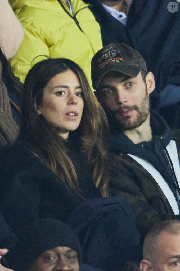 Exclusif - Louis Sarkozy et sa femme Natali Husic   - People en tribunes du match de Ligue 1 Uber Eats "PSG contre Reims" (1-1) au Parc des Princes à Paris le 29 janvier 2023. © Bestimage