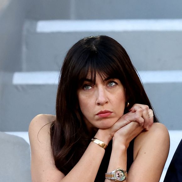 Nolwenn Leroy et son compagnon Arnaud Clément - Célébrités dans les tribunes des Internationaux de France de tennis de Roland Garros 2024 à Paris le 7 juin 2024.  © Jacovides-Moreau/Bestimage