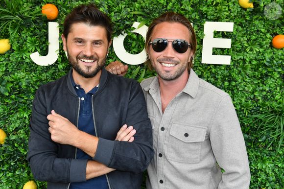 Christophe Beaugrand et son mari Ghislain Gerin - Soirée d’anniversaire des 5 ans de la marque Joone, sur la péniche La Barge à Issy-les-Moulineaux. Paris, le 30 juin 2022
© Veeren / Bestimage