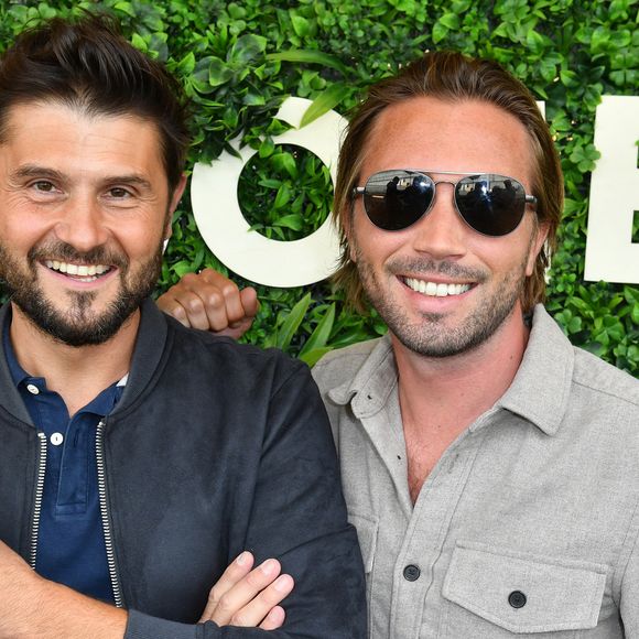 Christophe Beaugrand et son mari Ghislain Gerin - Soirée d’anniversaire des 5 ans de la marque Joone, sur la péniche La Barge à Issy-les-Moulineaux. Paris, le 30 juin 2022
© Veeren / Bestimage