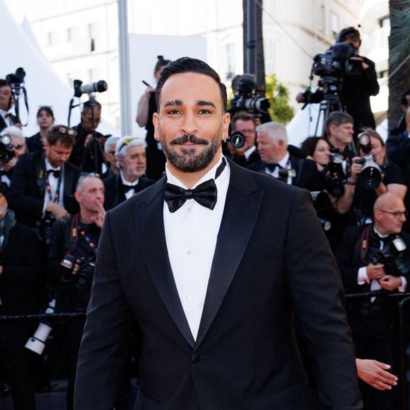 Adil Rami - Montée des marches du film " La vénus électrique " pour la cérémonie d'ouverture du 79ème Festival International du Film de Cannes, le 12 mai 2026. © Jacovides-Moreau /Bestimage