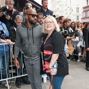 La maman de Rudy

Josiane Balasko et son fils adoptif Rudy Berry - Arrivées au défilé de mode "Jean Paul Gaultier", collection Haute-Couture automne-hiver 2015/2016, au siège de la marque Jean Paul Gaultier à Paris. Le 8 juillet 2015.
©Agence / Bestimage