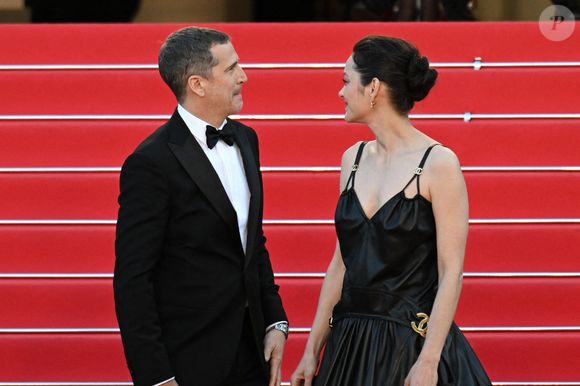 Marion Cotillard et Guillaume Canet assistent à la projection du film Karma lors du 79e Festival de Cannes à Cannes, France, le 15 mai 2026. Photo by Lionel Urman/ABACAPRESS.COM
