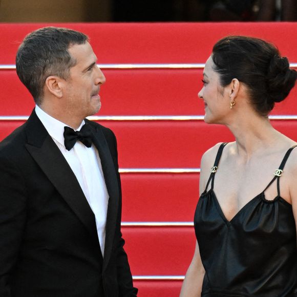 Marion Cotillard et Guillaume Canet assistent à la projection du film Karma lors du 79e Festival de Cannes à Cannes, France, le 15 mai 2026. Photo by Lionel Urman/ABACAPRESS.COM