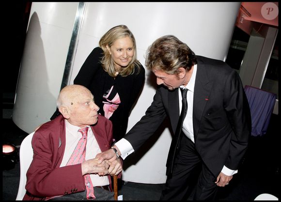 Serge Ravenel, compagnon de la libération, Johnny Hallyday - soirée pour la remise des insignes d'officier dans l'ordre de la légion d'honneur (archive)
©DOMINIQUE JACOVIDES / BESTIMAGE