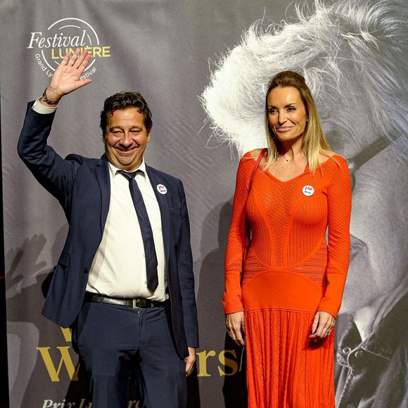Laurent Gerra et Christelle Bardet - Photocall de la cérémonie de remise du Prix Lumière à W.Wenders à l'occasion de la 15ème Edition du Festival Lumière de Lyon. Le 20 octobre 2023
© Sandrine Thesillat / Panoramic / Bestimage