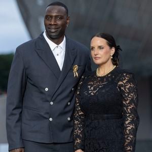 Omar Sy et sa Helene (bijoux Tasaki) - Photocall du dîner "Prelude pour les JO" à la Fondation Vuitton à Paris, France, le 25 juillet 2024. © Olivier Borde/Bestimage