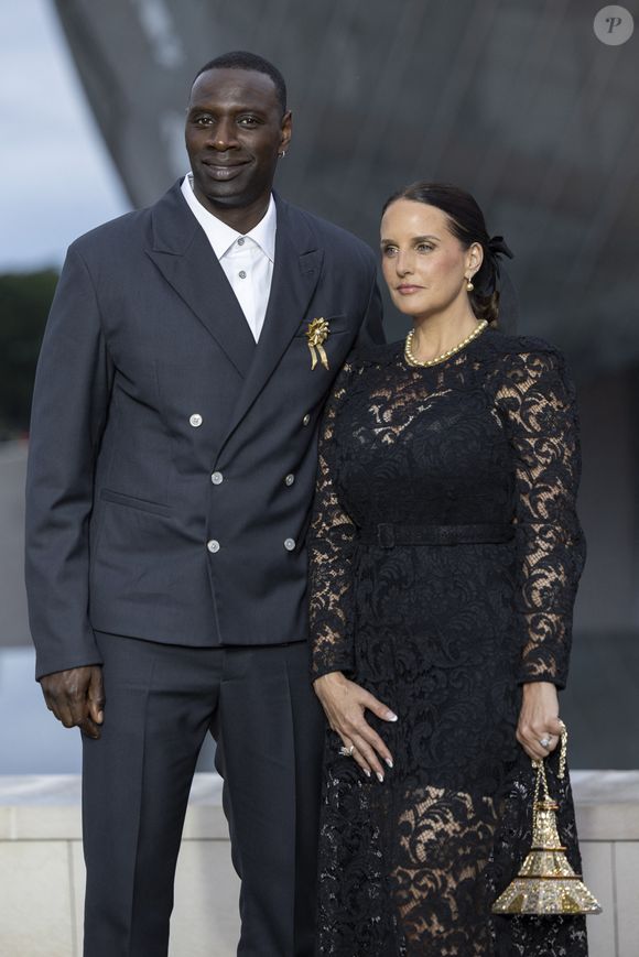 Omar Sy et sa Helene (bijoux Tasaki) - Photocall du dîner "Prelude pour les JO" à la Fondation Vuitton à Paris, France, le 25 juillet 2024. © Olivier Borde/Bestimage