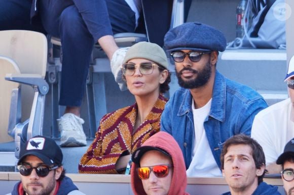 Nawell Madani et son compagnon Djebril Didier Zonga - Célébrités dans les tribunes des Internationaux de France de tennis de Roland Garros 2024 à Paris le 7 juin 2024.  © Jacovides-Moreau/Bestimage