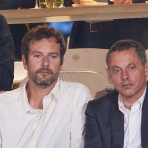 François Roelants et son mari Marc-Olivier Fogiel - Personnalités dans les tribunes lors des Internationaux de France de tennis de Roland Garros 2024 à Paris. Le 29 mai 2024
© Jacovides-Moreau / Bestimage