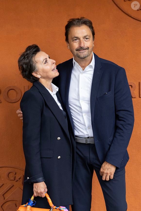 Henri Leconte et sa compagne Maria Dowlatshahi au village lors des Internationaux de France de Tennis de Roland Garros 2025. Paris, le 27 mai 2025. 
© Moreau / Jacovides / Bestimage