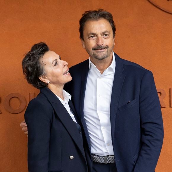 Henri Leconte et sa compagne Maria Dowlatshahi au village lors des Internationaux de France de Tennis de Roland Garros 2025. Paris, le 27 mai 2025. 
© Moreau / Jacovides / Bestimage