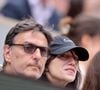 Mais l'actrice a fait savoir que tout n'était pas rose comme dans n'importe quel couple
Charlotte Gainsbourg, son compagnon Yvan Attal dans les tribunes lors des Internationaux de France de Tennis de Roland Garros 2022. Paris, le 5 juin 2022. © Dominique Jacovides/Bestimage