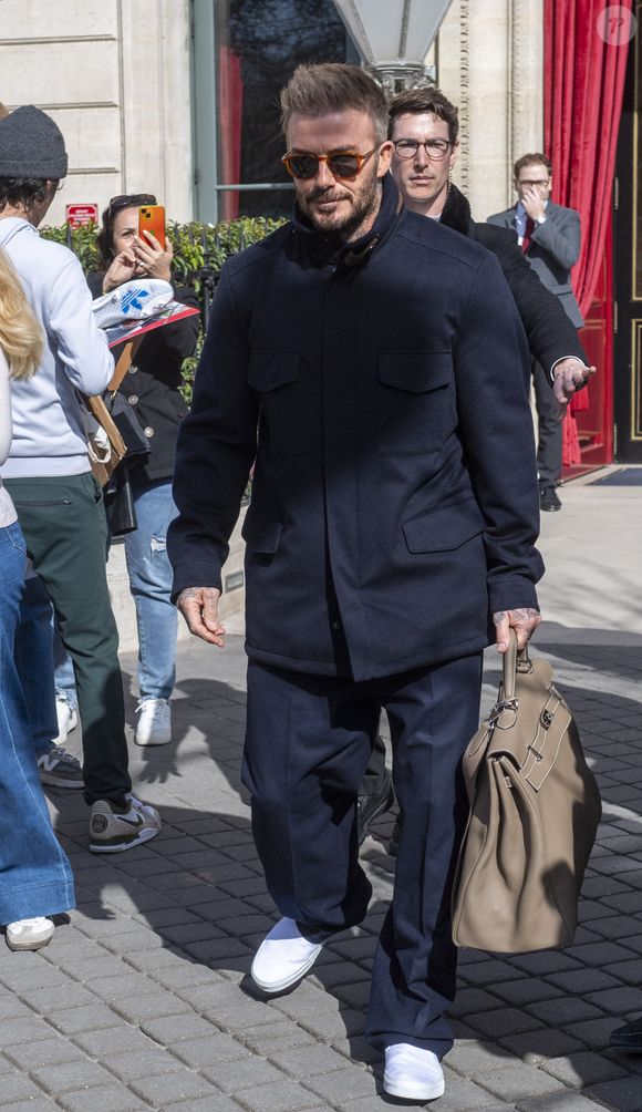 David Beckham - Les Beckham quittent leur hôtel La Réserve, à Paris, le 8 mars 2025.  GOFF INF / BESTIMAGE