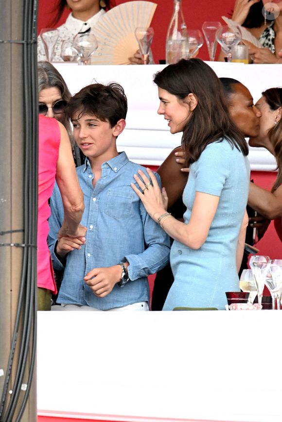 La princesse Caroline de Hanovre, sa fille Charlotte Casiraghi, son fils, né de son union avec Gad Elmaleh, Raphael, lors deà la 2eme journée du Jumping International de Monte-Carlo, le 4 juillet 2024. La compétition se déroule sur le port Hercule à Monaco, du 3 juillet au 5 juillet. © Bruno Bebert/Bestimage