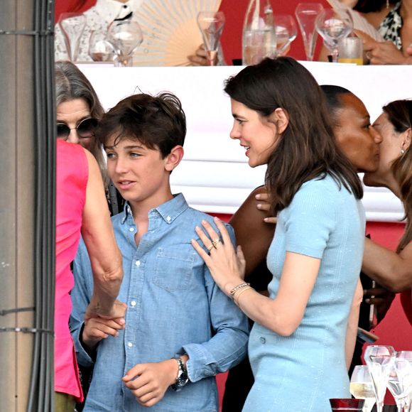 La princesse Caroline de Hanovre, sa fille Charlotte Casiraghi, son fils, né de son union avec Gad Elmaleh, Raphael, lors deà la 2eme journée du Jumping International de Monte-Carlo, le 4 juillet 2024. La compétition se déroule sur le port Hercule à Monaco, du 3 juillet au 5 juillet. © Bruno Bebert/Bestimage