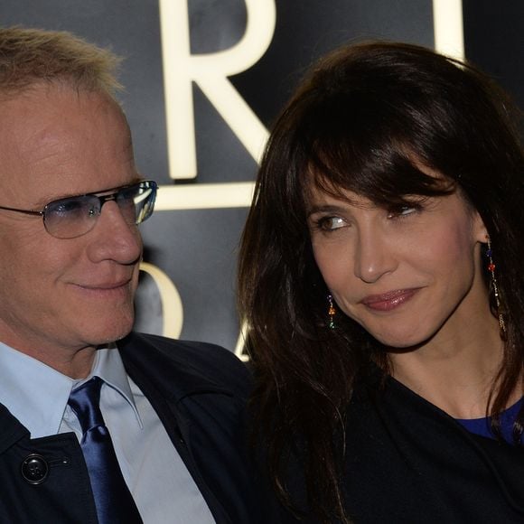 Sophie Marceau etChristophe Lambert - Arrivee des people au defile Giorgio Armani Haute Couture Printemps/Ete 2014 au Palais de Tokyo a Paris, le 21 janvier 2014. © VEEREN / BESTIMAGE