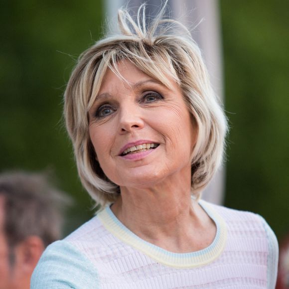 "J’ai une vie tout à fait normale, j’ai de bons gènes", explique-t-elle. 

Evelyne Dheliat lors de la 7eme Edition de la Petanque Gastronomique au Port de Grenelle le 27 juin 2019 à Paris, France. Photo par Nasser Berzane/ABACAPRESS.COM
