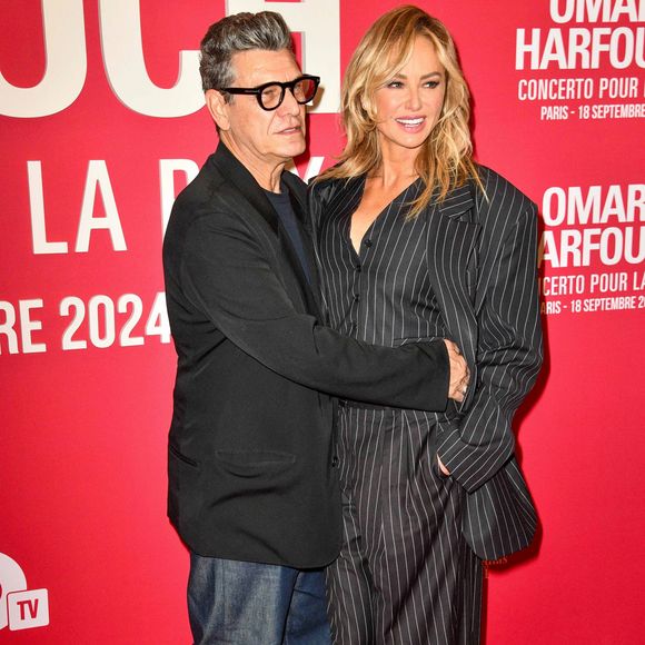 Marc Lavoine et Adriana Karembeu assistent à un photocall pour le Concerto For Peace d'Omar Harfouch au Théâtre des Champs-Elysées le 18 septembre 2024 à Paris, France. Photo par Shootpix/ABACAPRESS.COM