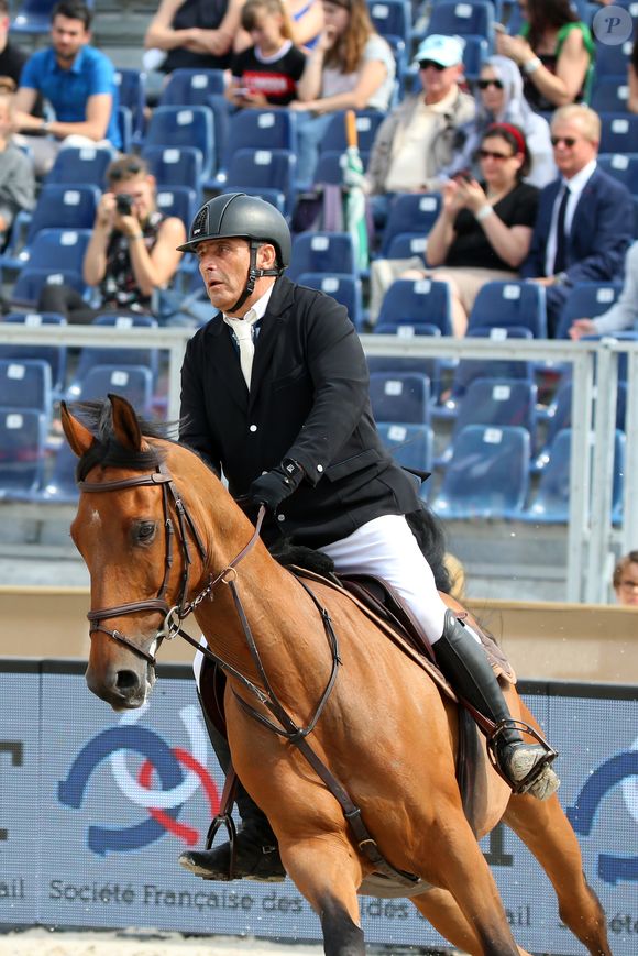 Serge Varsano sur Luca Toni - Prix "L'Envol" lors du Longines Paris Eiffel Jumping au Champ de Mars à Paris. Le 5 juillet 2018