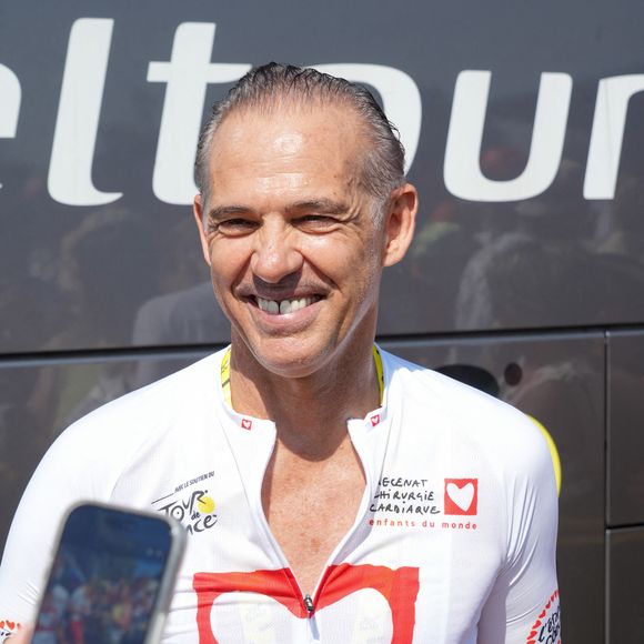Exclusif - Paul Belmondo - Les célébrités lors de “L'Etape du Coeur” de l’association Mécénat Chirurgie Cardiaque lors de la 12ème étape de la 113ème édition du Tour de France entre Nevers et Chalon-sur-Saône, France, le 16 juillet 2026. © Anne-Sophie Guebey/Bestimage
