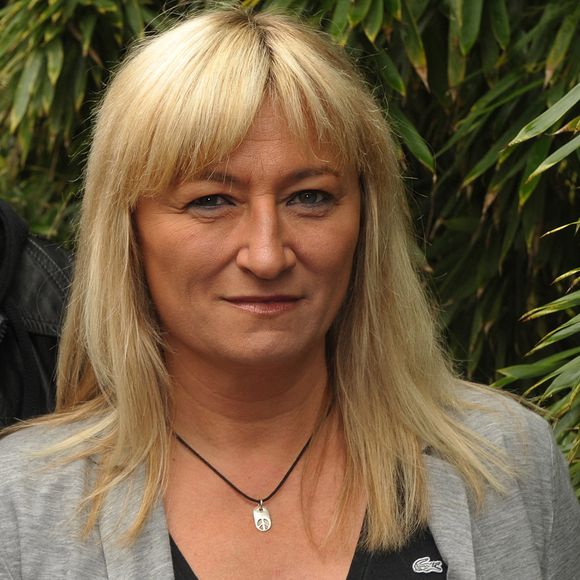Christine Bravo et son petit ami arrivent à l'espace VIP 'Le Village' pendant les Internationaux de France de Tennis 2009 à Roland Garros à Paris, France le 6 juin 2009. Photo by Gorassini-Guignebourg/ABACAPRESS.COM