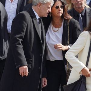 Francis Huster et Cristiana Reali après les funérailles de Jean-Paul Belmondo à l'église Saint-Germain-Des-Pres à Paris, France, le 10 septembre 2021. Le célèbre acteur français Jean-Paul Belmondo est décédé lundi 6 septembre à l'âge de 88 ans. Photo by ABACAPRESS.COM