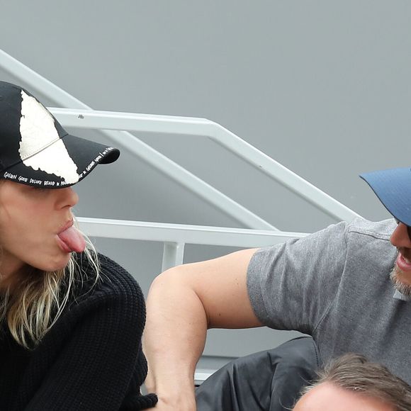Marion Cotillard et Guillaume Canet - People dans les tribunes lors de la finale messieurs des internationaux de France de tennis de Roland Garros 2019 à Paris le 9 juin 2019. © Jacovides-Moreau/Bestimage