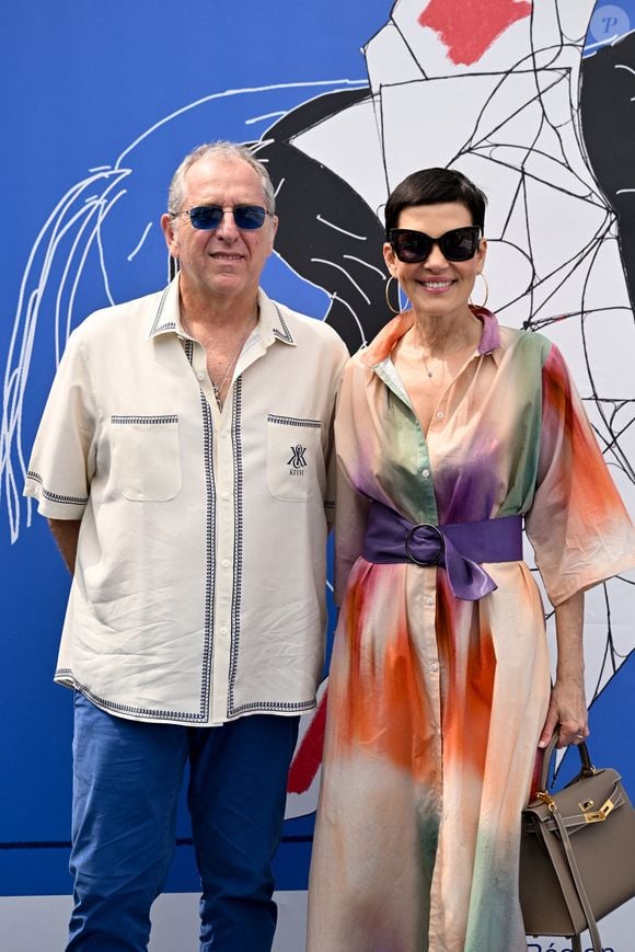 Exclusif - Cristina Cordula et son mari Frédéric Cassin dans la tente VIP lors du Longines Paris Eiffel Jumping au pied de la Tour Eiffel sur le Champ-de-Mars à Paris, France, le 22 juin 2025.

© Perusseau-Veeren/Bestimage