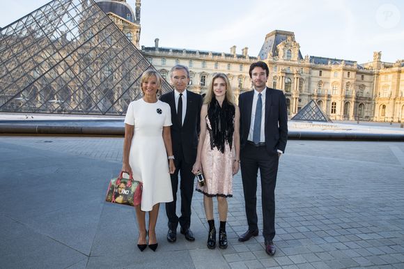 Bernard Arnault et sa femme Hélène Arnault, Antoine Arnault et sa compagne Natalia Vodianova - Photocall - Cocktail du dîner de présentation de la nouvelle collection Vuitton "Masters, Les Grands Maîtres" en collaboration avec Jeff Koons au Louvre à Paris, le 11 avril 2017. © Olivier Borde/Bestimage