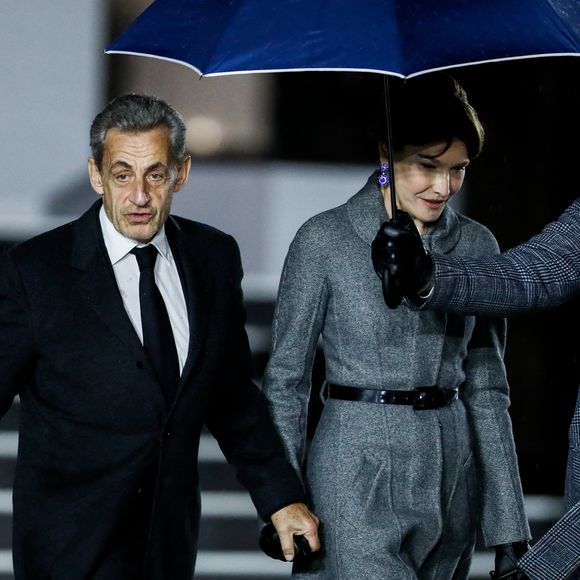 Nicolas Sarkozy et sa femme Carla Bruni - Arrivées à la cérémonie de réouverture de la cathédrale Notre-Dame de Paris, le 7 décembre 2024. Joyau de l’art gothique, lieu de culte et de culture, symbole universel de la France et de son histoire, la cathédrale de Notre-Dame de Paris rouvre ses portes les 7 et 8 décembre, cinq ans après le terrible incendie qui l’avait ravagée le 15 avril 2019. © Bestimage