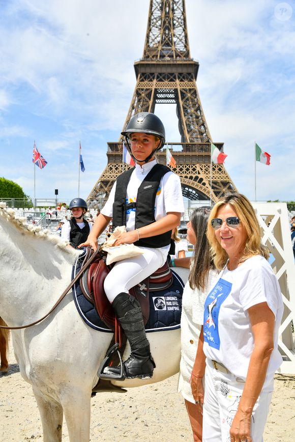 Giulia Sarkozy sur Valentine, Virginie Coupérie-Eiffel lors de la coupe Kids Cup L'Envol lors du Longines Paris Eiffel Jumping le 20 juin 2025

© Perusseau / Veeren / Bestimage