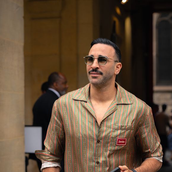 Adil Rami - Les célébrités au défilé Drôle de Monsieur  "Collection Homme Prêt-à-Porter Printemps/Eté 2026" lors de la Fashion Week de Paris, le 26 juin 2025.
© Florian Lavielle/Bestimage