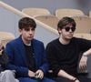 L'interprète du titre "Casser la voix" et ex d'Amanda Sthers explique ensuite qu'il compte rester vivre à Los Angeles et que ses enfants ont depuis été relogés. 

Clémence Cherier, Léon et Oscar Bruel dans les tribunes des Internationaux de France de tennis de Roland Garros 2024 à Paris, France, le 2 juin 2024. © Jacovides-Moreau/Bestimage