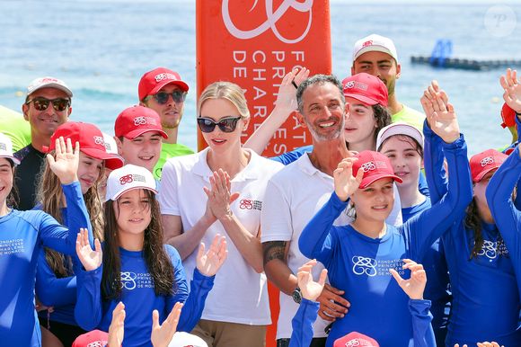 La princesse Charlène de Monaco et Pierre Frolla lors de la journée "Water Safety Day, pour la prévention de la noyade" sur la plage du Larvotto de Monaco, le 17 juin 2025. Cet événement est organisé par sa Fondation, le Centre de Sauvetage Aquatique de Monaco (CSAM) en partenariat avec la Croix-Rouge monégasque. © Claudia Albuquerque/Bestimage