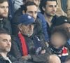 Michel Cymes - Célébrités des les tribunes lors du match aller du quart de finale de Ligue des champions entre le PSG et Aston Villa (3-1) au Parc des Princes à Paris le 9 avril 2025. © Cyril Moreau/Bestimage