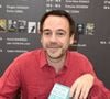 Michel Bussi présent au Salon du Livre de Paris 2017, qui s'est tenu à la Porte de Versailles à Paris, en France, le 25 mars 2017. Photo : Alban Wyters/ABACAPRESS.COM