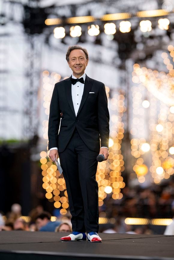 Exclusif - Stéphane Bern - 13ème édition du Concert de Paris aux pieds de la Tour Eiffel à l’occasion de la fête nationale du 14 juillet proposé par Radio France, France Télévisions, la Ville de Paris, et Électron Libre Productions. © Perusseau / Clovis / Bestimage