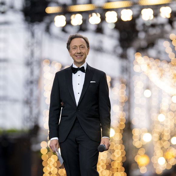 Exclusif - Stéphane Bern - 13ème édition du Concert de Paris aux pieds de la Tour Eiffel à l’occasion de la fête nationale du 14 juillet proposé par Radio France, France Télévisions, la Ville de Paris, et Électron Libre Productions. © Perusseau / Clovis / Bestimage