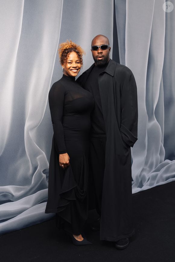 Teddy Riner et sa femme Luthna - Photocall du défilé de mode Femmes prêt-à-porter automne-hiver 2024/2025 "Balenciaga", dans la cour du Dôme des Invalides, lors de la fashion week de Paris. Le 3 mars 2024
