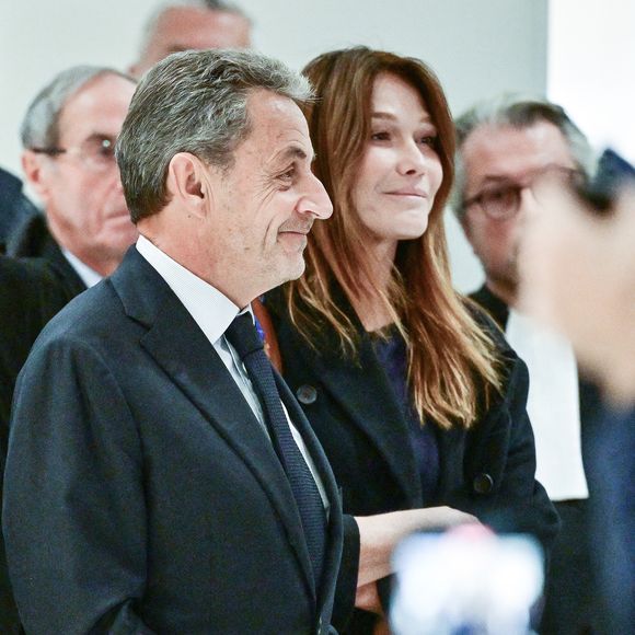Nicolas Sarkozy et sa femme Carla Bruni - Nicolas Sarkozy condamné à 5 ans de prison à l'issue du procès de l'affaire du financement libyen au tribunal correctionnel de Paris, le 25 septembre 2025. L'ancien chef de l'Etat était accompagné de sa femme, C.Bruni. Nicolas Sarkozy, jugé coupable d’association de malfaiteurs, sera prochainement convoqué en vue de lui signifier la date de son incarcération. 
© Christian Liewig / Bestimage